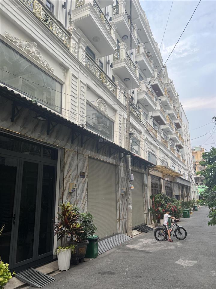 Nhà mới đẹp 4x15m trệt 4lầu hxh lê văn quới