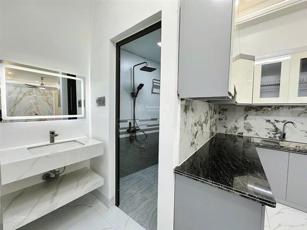 Xe hơi đậu cửa, nhà 4 tầng mới tk hiện đại. hẻm thông nơ trang long  nguyễn xí. giá gấp 10,76 tỷ