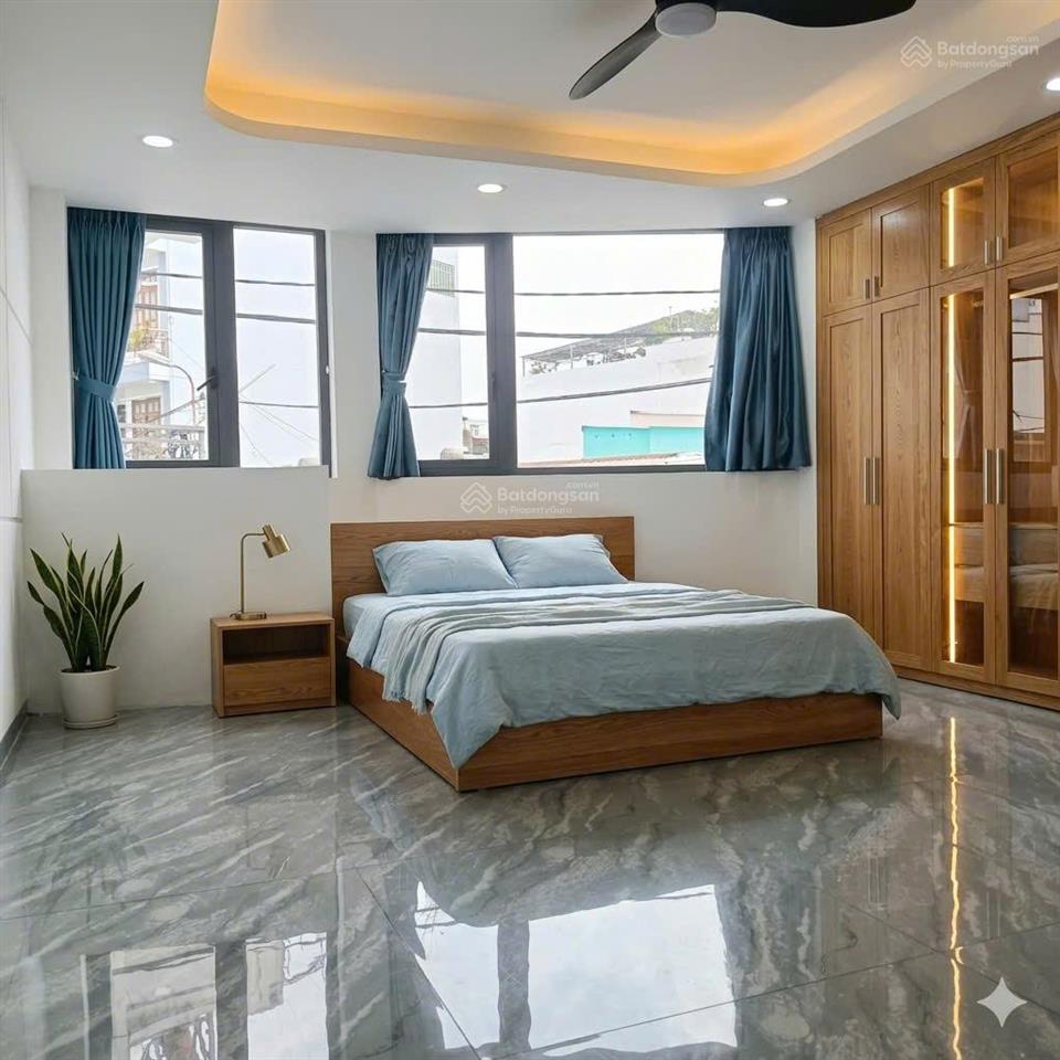 Nhà mới  đẹp 5 tầng x 43m2  nội thất sang  hẻm 2 xe hơi ra nguyễn thái sơn