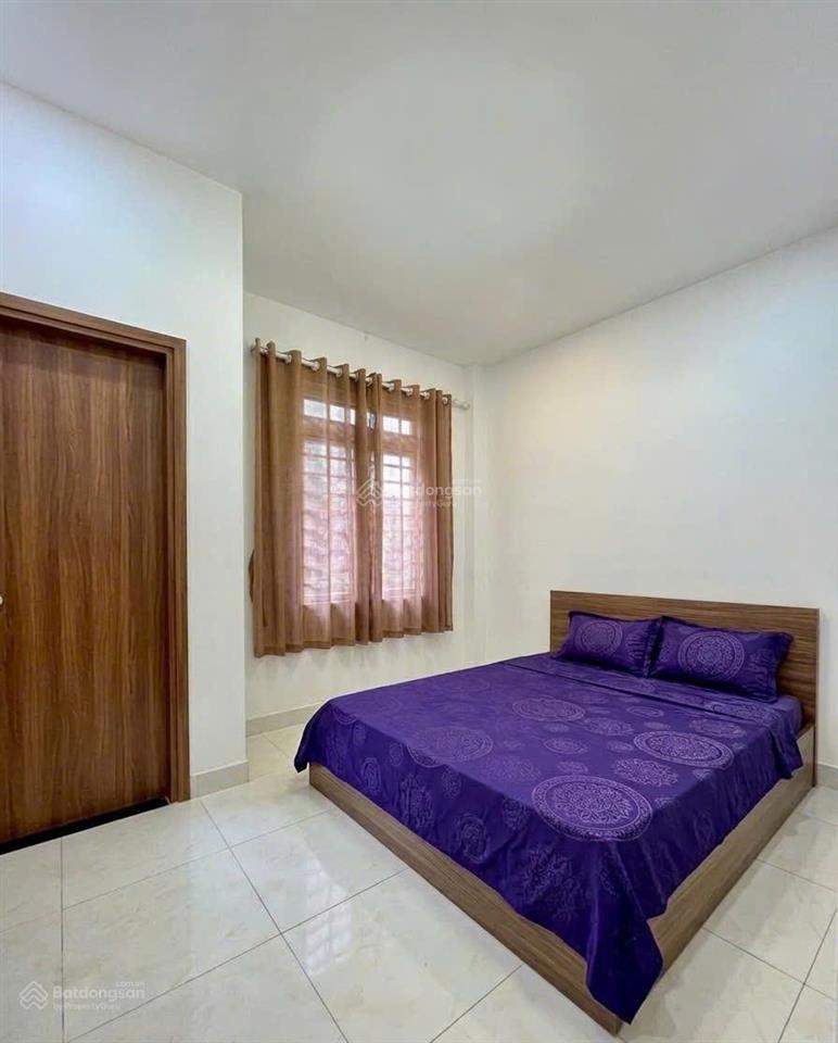 Giảm sâu  nhà 44,6m2 x 4 tầng  xe hơi đậu cửa thông ra đường phan đình phùng
