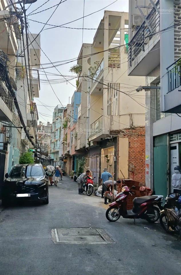 Giảm sâu  nhà 44,6m2 x 4 tầng  xe hơi đậu cửa thông ra đường phan đình phùng