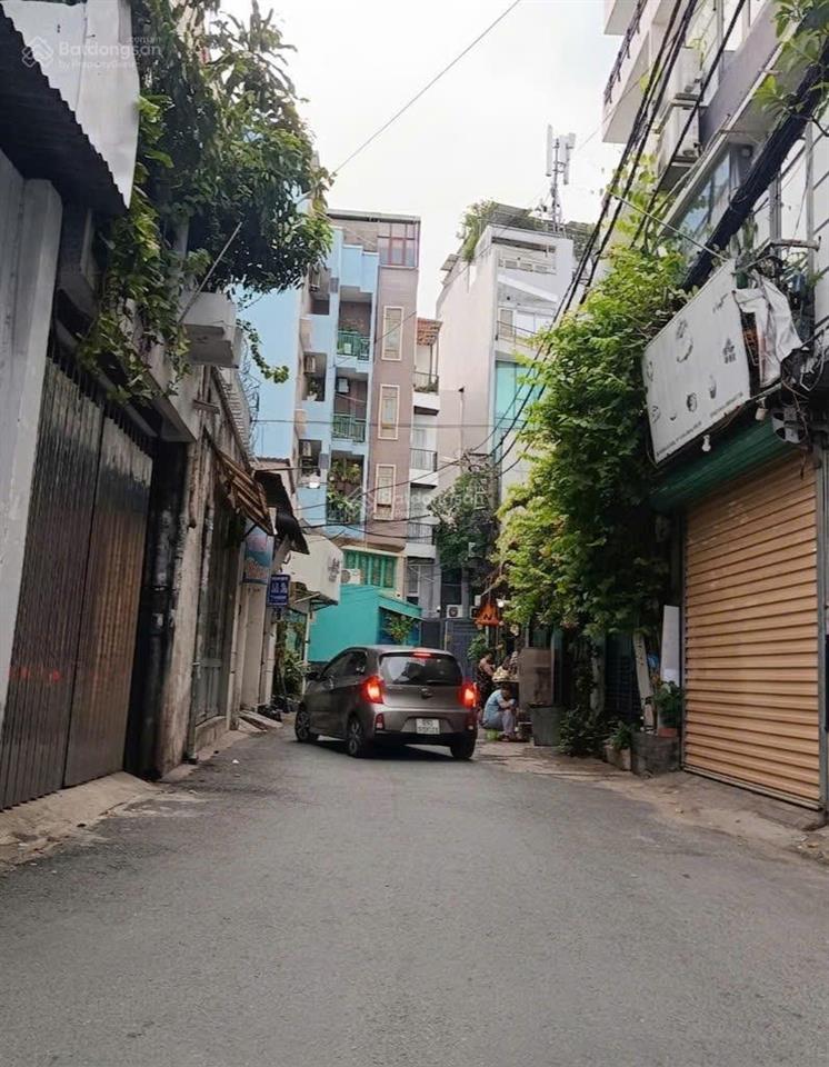 Nhà 4 tầng x 66m² hẻm xe hơi thông ra đường lê quang định giá tốt