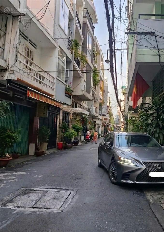 * giá sốc * nhà 2 tầng x 55m2  xe hơi đậu cửa ngay đầu nguyễn văn đậu, kề phú nhuận