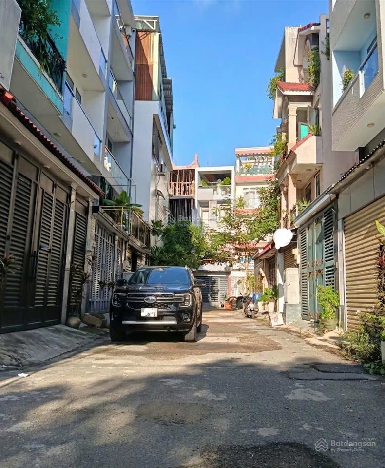 Gấp bán 39m2 x 4 tầng nhà đẹp, hẻm 2 xe hơi thông ra dương quảng hàm