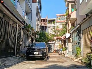 Bán rất gấp  4 tầng nhà đẹp, hẻm 2 xe hơi thông ra dương quảng hàm