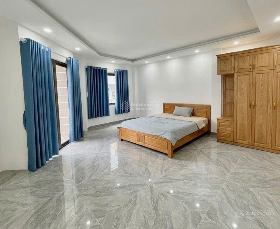Giá tốt  bán 5 tầng nhà mới  xe hơi đậu cửa thông ra đường đặng văn ngữ  q. phú nhuận