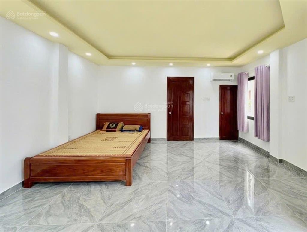 Giá tốt  bán 5 tầng nhà mới  xe hơi đậu cửa thông ra đường đặng văn ngữ  q. phú nhuận