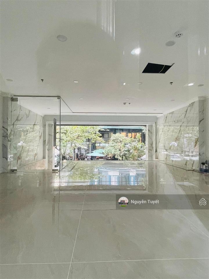 Cho thuê tòa ốp kính nguyên hồng  láng hạ 90m2 x 7 tầng, thông sàn, thang máy. giá thuê 50tr/th