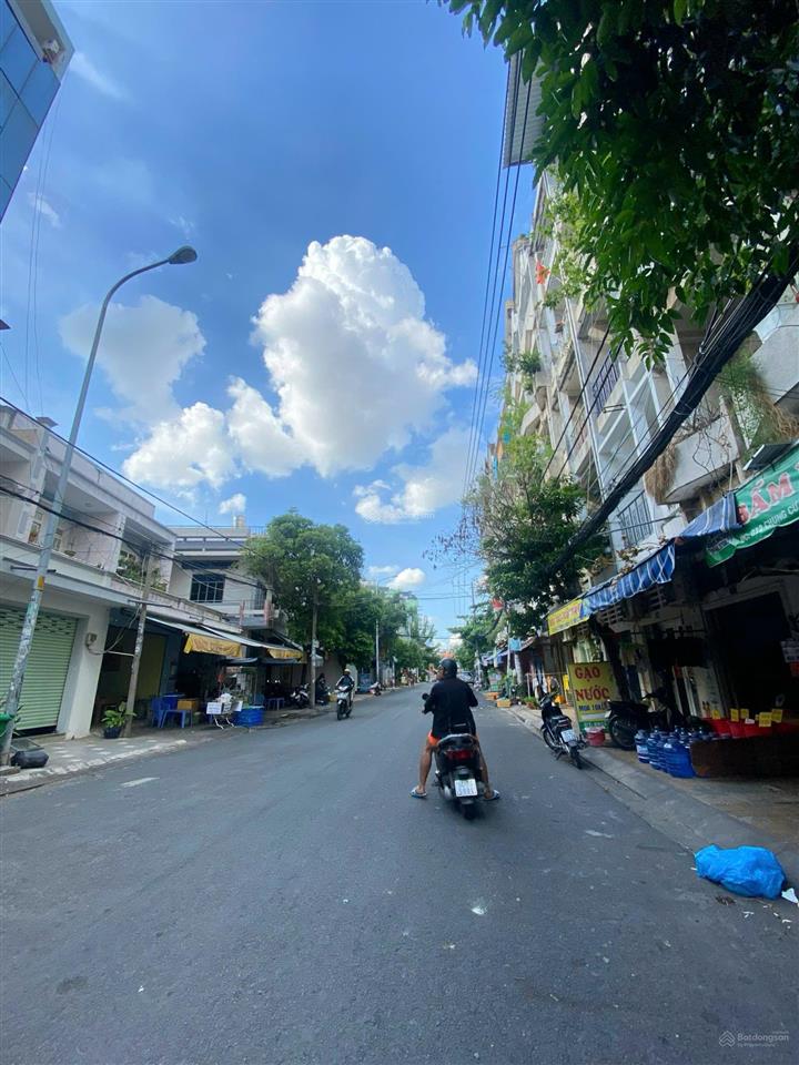 Trục kd nguyễn xuân khoát  bán nhà 8x20m, 1 hầm 4 lầu giá 32 tỷ