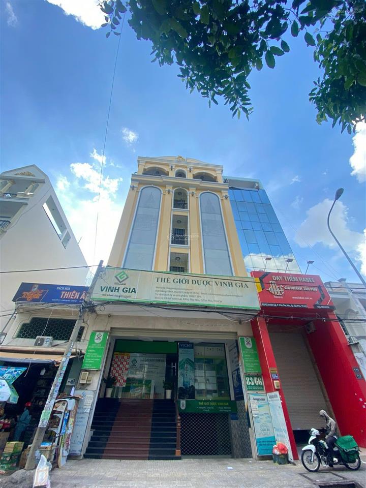 Trục kd nguyễn xuân khoát  bán nhà 8x20m, 1 hầm 4 lầu giá 32 tỷ