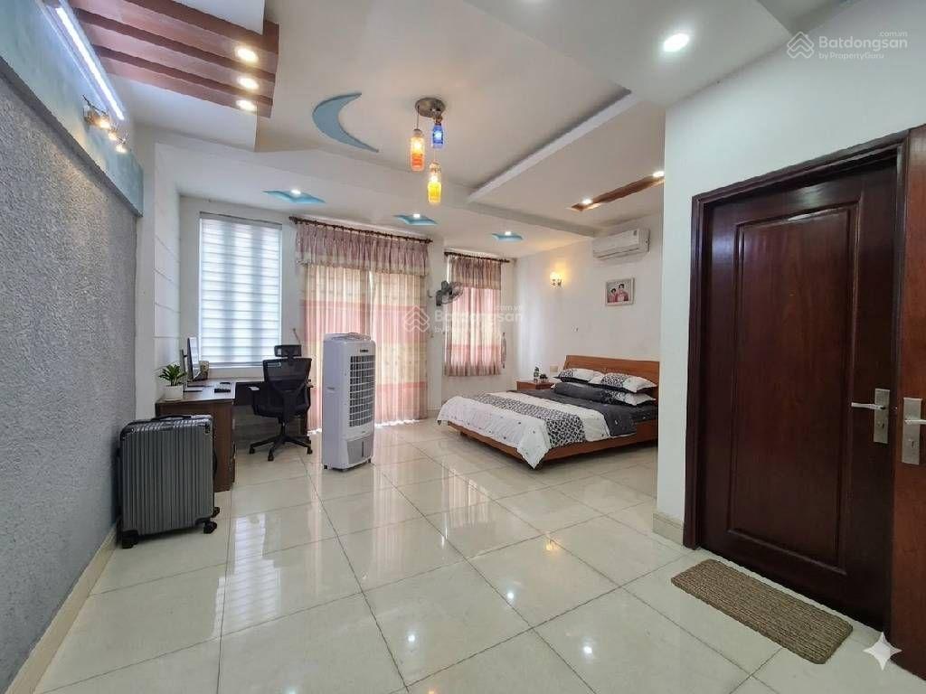 Kdc phú nhuận lê thị riêng q12  5.7x14 nhà 2 lửng + 4 lầu đường xe hơi thông 10 m có gara oto