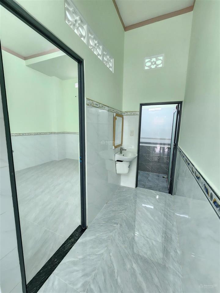 Bán nhà 1 trệt 1 lầu( 102,2m2 ) đ cây da .p dĩ an tphcm .đường thông mt kd buôn bán chính chủ