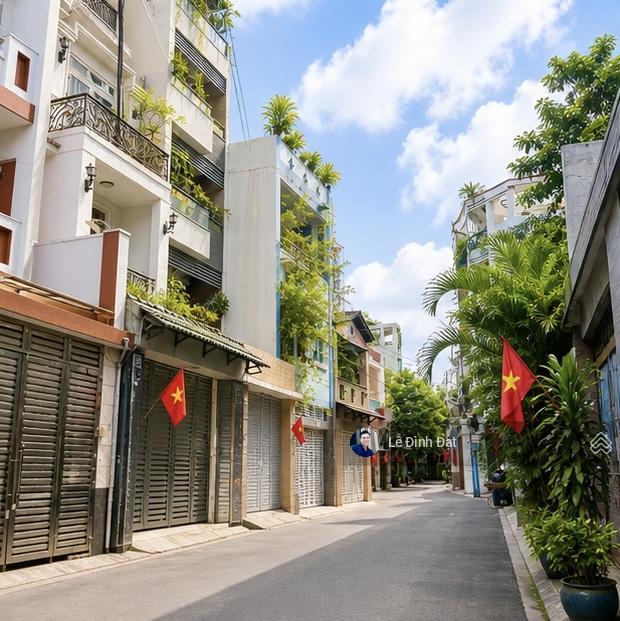 Hàng xóm cư xá lữ gia  lý thường kiệt  90m2, giếng trời đón sáng, xe hơi ngủ nhà.