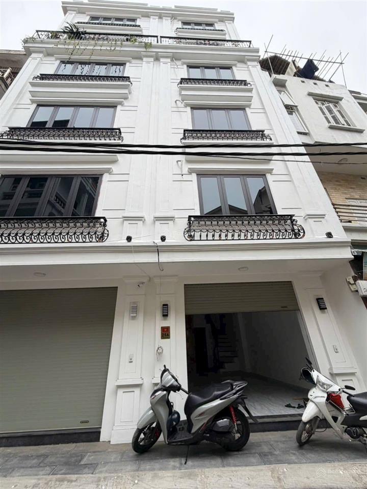 Toà 8 tầng mặt phố văn chương  ô tô tránh vỉa hè 3m  dt 52/84m  giá 21 tỷ