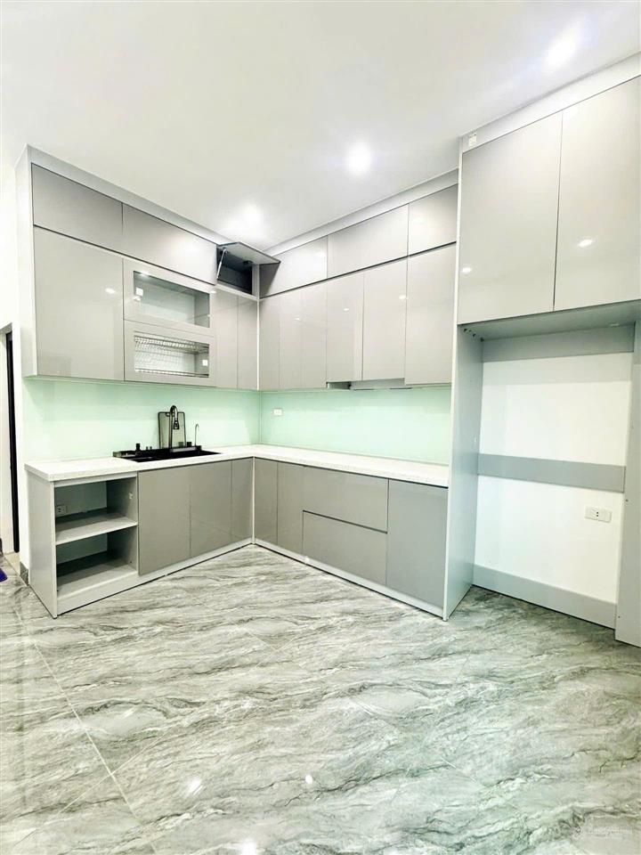 Thang máy 2 mặt thoáng ô tô dừng đỗ