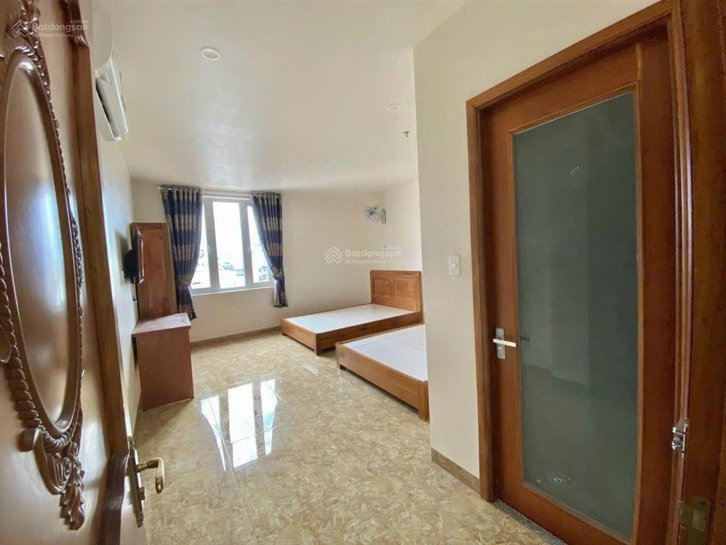 Bán nhà trần quốc hoàn 87m²  khách sạn hầm + 6 tầng  20 phòng  thu 1.4 tỷ/năm  giá 36 tỷ
