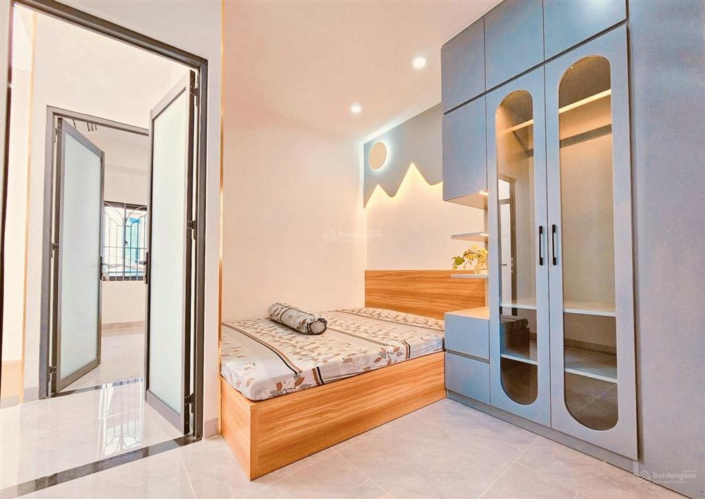 Nhỉnh 3 tỷ nhà mới 2 mặt tiền  hẻm xe hơi, tặng full nội thất đường bùi quang là  gò vấp