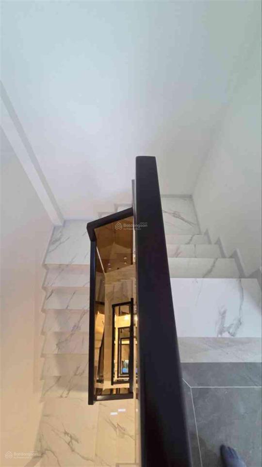 Sát mặt tiền chợ bà chiểu  55m2  ô tô đỗ cửa  5 tầng