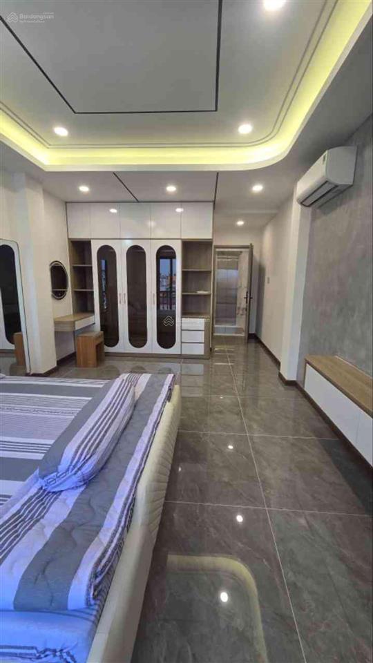 Sát mặt tiền chợ bà chiểu  55m2  ô tô đỗ cửa  5 tầng