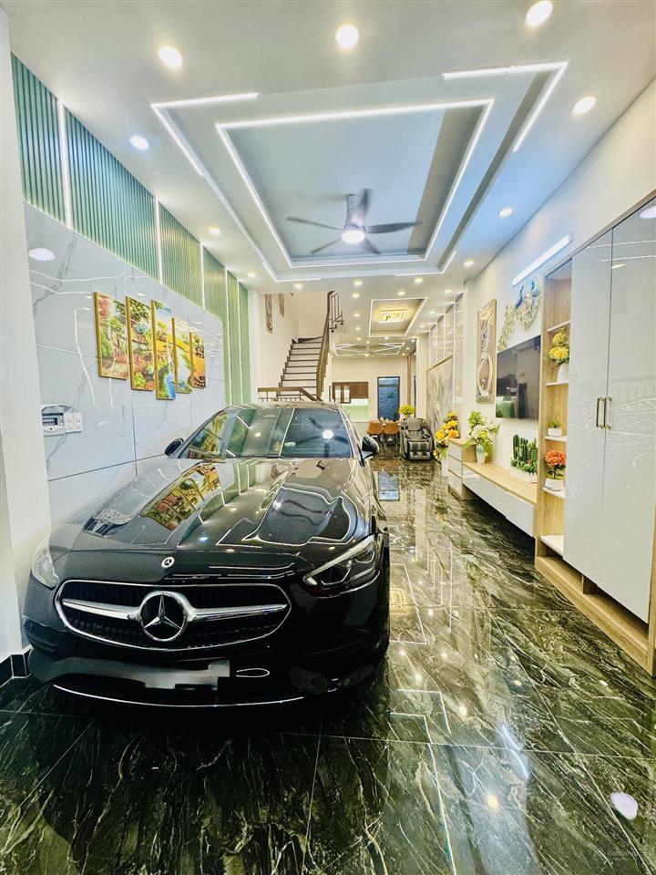 Bán nhà mới p.8 quang trung 4 tầng, xe hơi ngủ trong nhà, 67m2 (4.2*16), ngay chợ hạnh thông tây