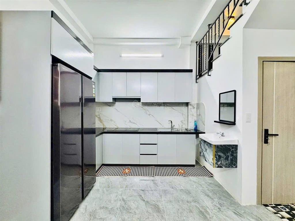 Nhà hẻm xe hơi trường sa, p.14 quận 3. giá 3,96 tỷ. dt 67m2. 2 tầng. 2pn 3wc. sổ hồng riêng
