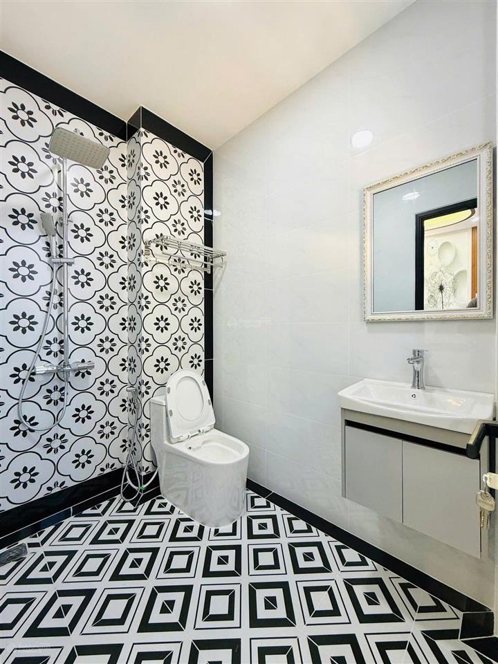 Bán nhà lý chiêu hoàng, 5 x 12, 4 tầng btct, 4pn có sân thượng, nội thất đẹp,hẻm nhựa 6m an ninh