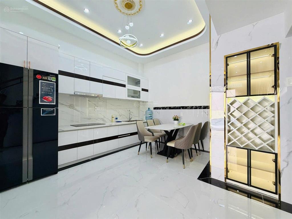 Bán nhà lý chiêu hoàng, 5 x 12, 4 tầng btct, 4pn có sân thượng, nội thất đẹp,hẻm nhựa 6m an ninh