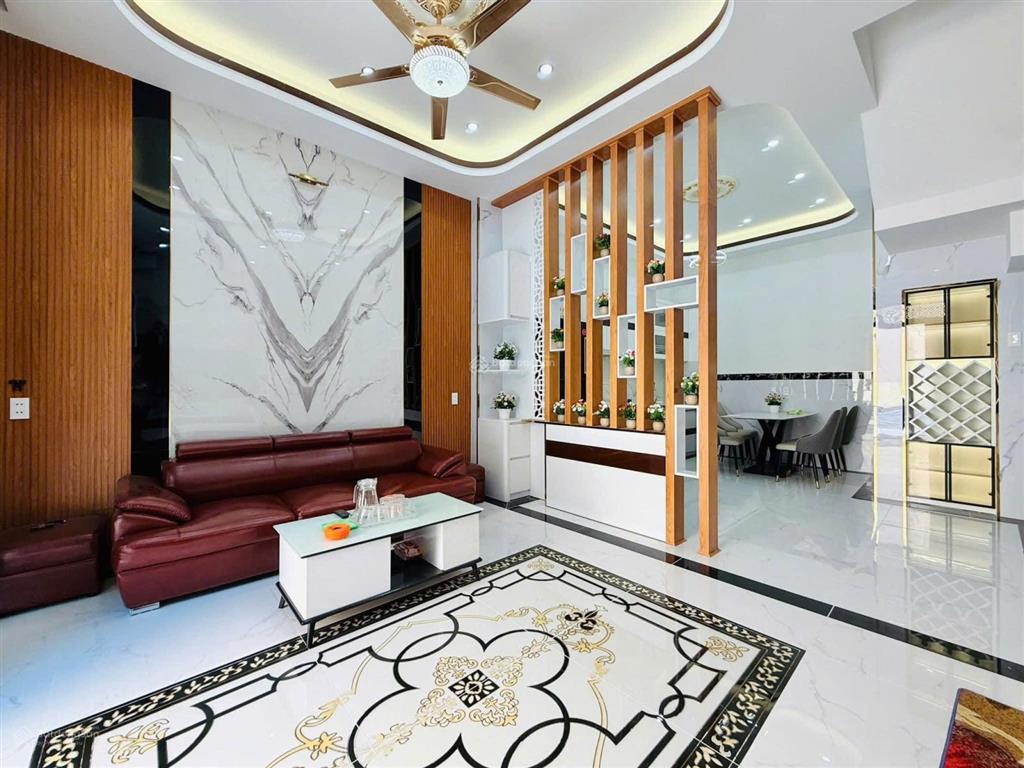 Bán nhà lý chiêu hoàng, 5 x 12, 4 tầng btct, 4pn có sân thượng, nội thất đẹp,hẻm nhựa 6m an ninh