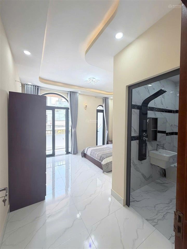 Nhà phố 2 lầu 4,5x17m mặt tiền đường nhựa nhánh lê thị hà gần chợ hóc môn