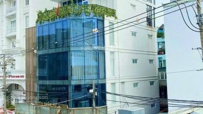 Tòa nhà góc 2 mặt tiền ngay hai bà trưng quận 1  dt 10x18m  h7t  hđt 230tr  giá chỉ 65 tỷ