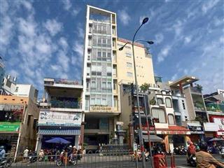 Tòa nhà 2 hầm 10 tầng mt phan đăng lưu, dt 7,5mx32m 180m2, giá 130 tỷ tl
