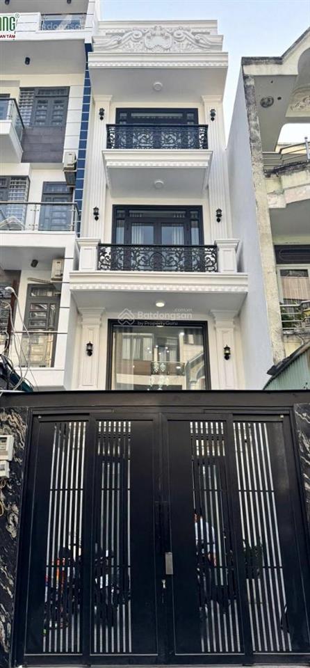 Nhà mới 4 tầng, 100m2, mặt tiền phước bìnhphước long b. xe hơi trong nhà. chỉ 14.8 tỷ thương lương