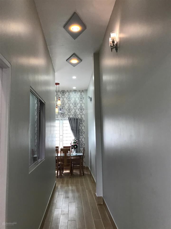 Bán nhanh 3,3 tỷ tl  nhà hẻm quốc lộ 50, đa phước. dt 100 m2 (5.63m x 18.45m)