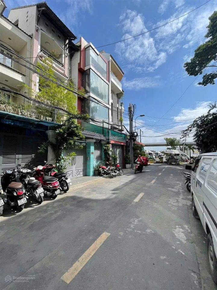 Bán tòa nhà làm văn phòng khu sân bay mặt tiền sầm sơn, dt 5x24m, hầm 4 tầng, giá chỉ 25 tỷ