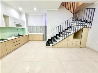 Nhà bình thạnh 4 tầng, hẻm xe hơi ngang 6m sát mặt tiền phan văn trị gần chợ bà chiểu