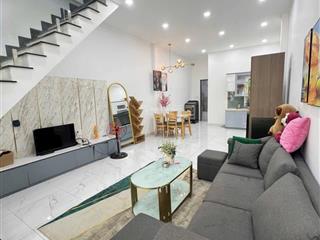 Nhà 1 trệt 1 lầu 100m², cách trường đại học bình dương 500m, mặt tiền đường nguyễn bình