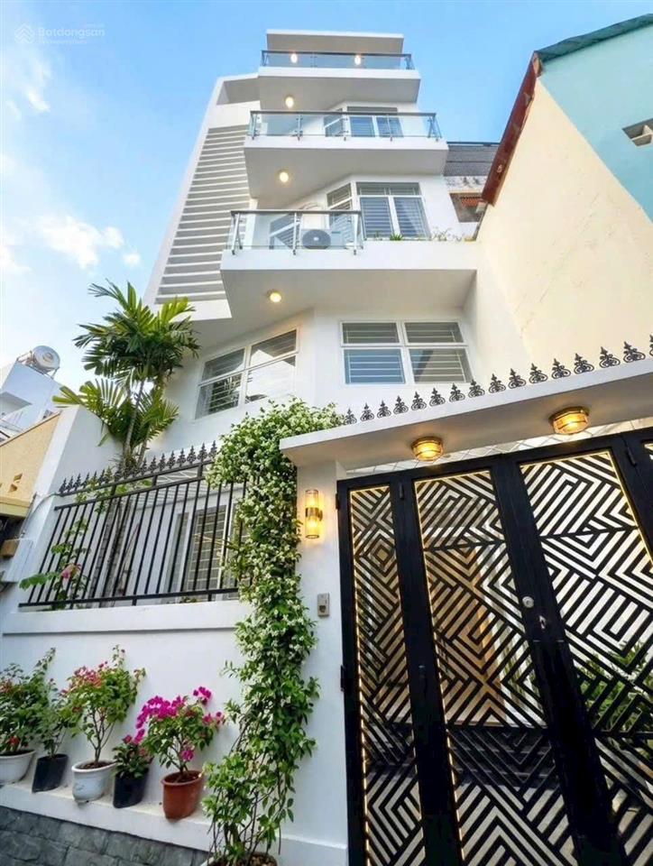 Nhà đẹp 5 tầng (5,8x7m )cmt8 quận 10  hẻm thông  nhà mới ở liền giá 7 tỷ 200 tl