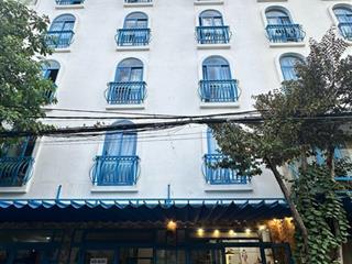 Bán tòa căn hộ 6 tầng sát phan đăng lưu  ngang 10m  dòng tiền 120tr/1tháng