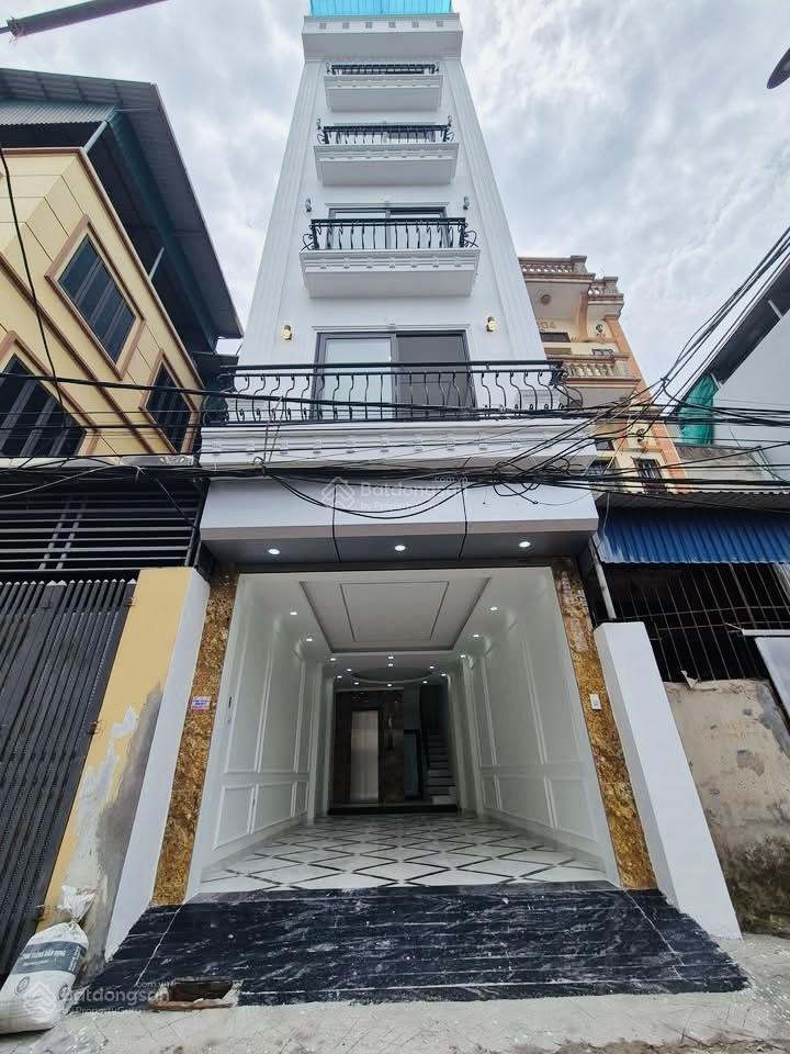 Nhà lò đúc hai bà trưng ngõ nông gần phố 30m ra oto 52m2 6 tầng thang máy 4m mặt tiền ở ngay 11.8t