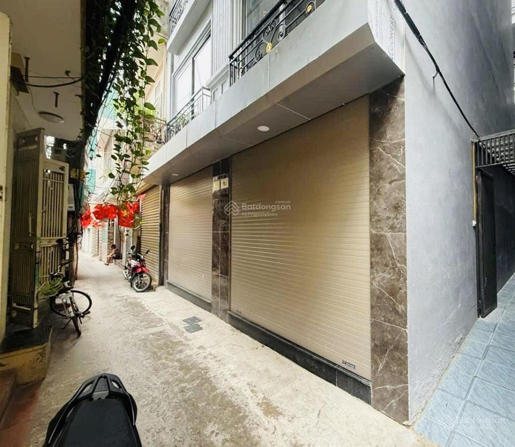 Cực hiếm nhà láng hạ đống đa ngõ thông oto đỗ cổng 33m2 6 tầng thang máy 7.9 tỳ