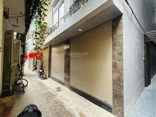 Cực hiếm nhà láng hạ đống đa ngõ thông oto đỗ cổng 33m2 6 tầng thang máy 7.9 tỳ