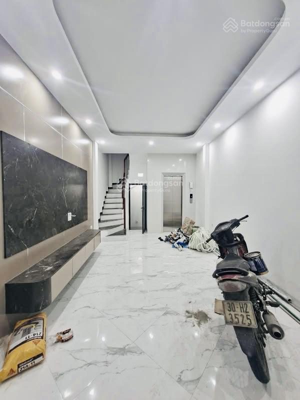 Cực hiếm nhà láng hạ đống đa ngõ thông oto đỗ cổng 33m2 6 tầng thang máy 7.9 tỳ