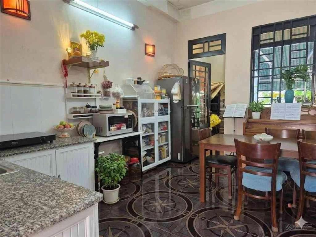 Bán nhà hẻm xe hơi cách mặt tiền đường lê quang định 80m ngang 6,4m dòng tiền 30triệu/t. giá 12,8tỷ