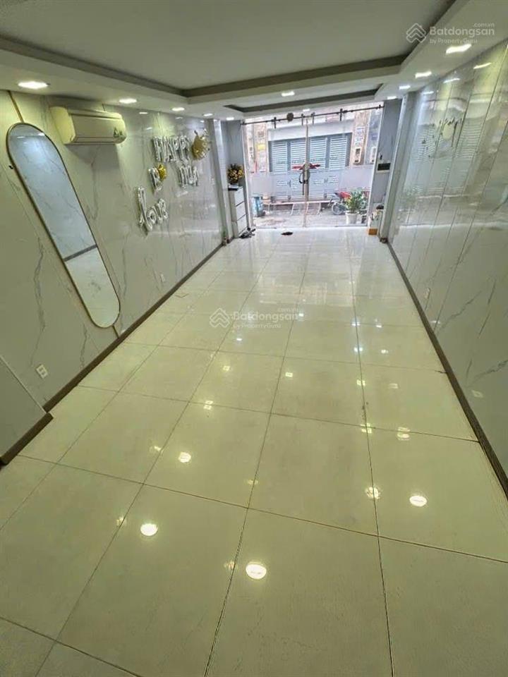 Bán nhà cách mặt tiền đường phạm văn đồng 20m,6 tầng có thang máy dòng tiền40triệu/t.giá 12,3 tỷ