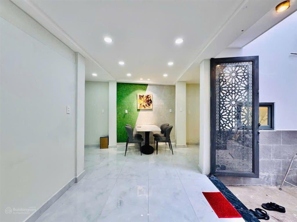 Bán nhà 2 mặt hẻm đẹp full nội thất cách mặt tiền đường hoàng hoa thám 10m, 4 tầng. giá 5,5 tỷ