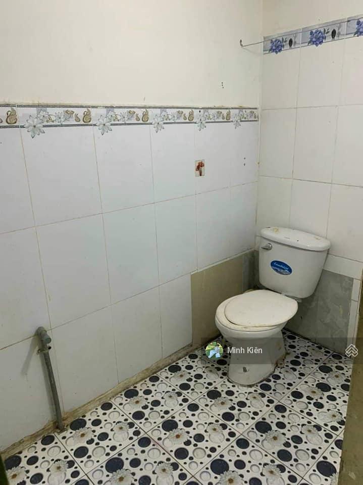 Chủ gửi bán căn nhà dt 98m2, bàn giao thô, sổ riêng ngay đường trung mỹ tân xuân