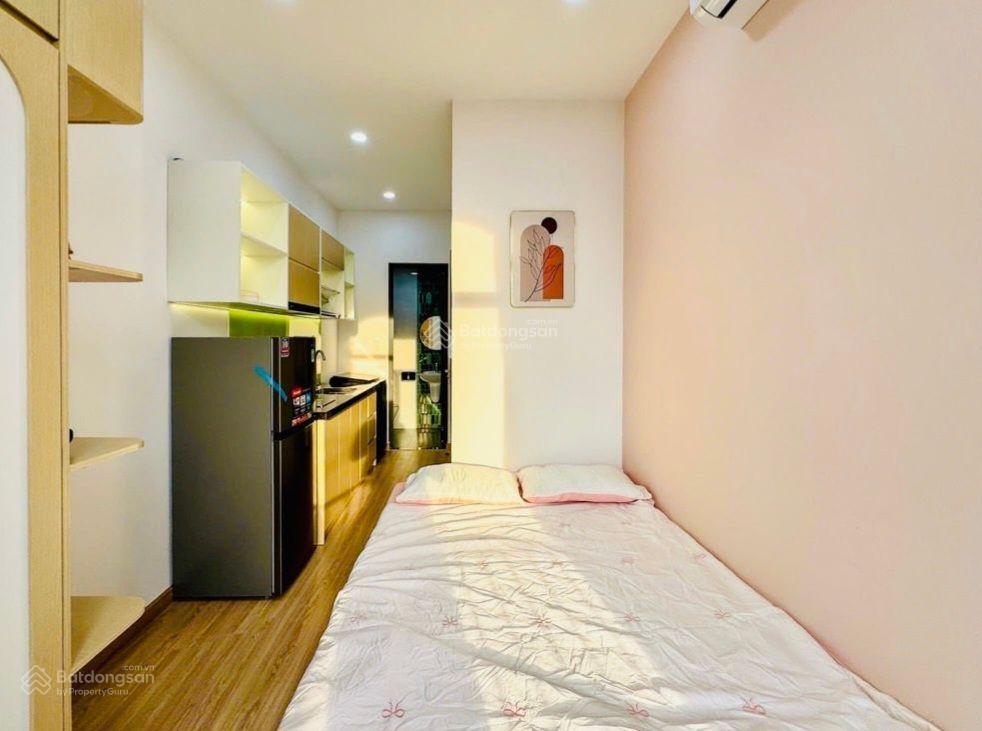 Tòa nhà nguyễn văn trỗi 110m2, 7 tầng, thang máy, 5,25x20, 15 chdv, dòng tiền 90tr/tháng, 15 tỷ.