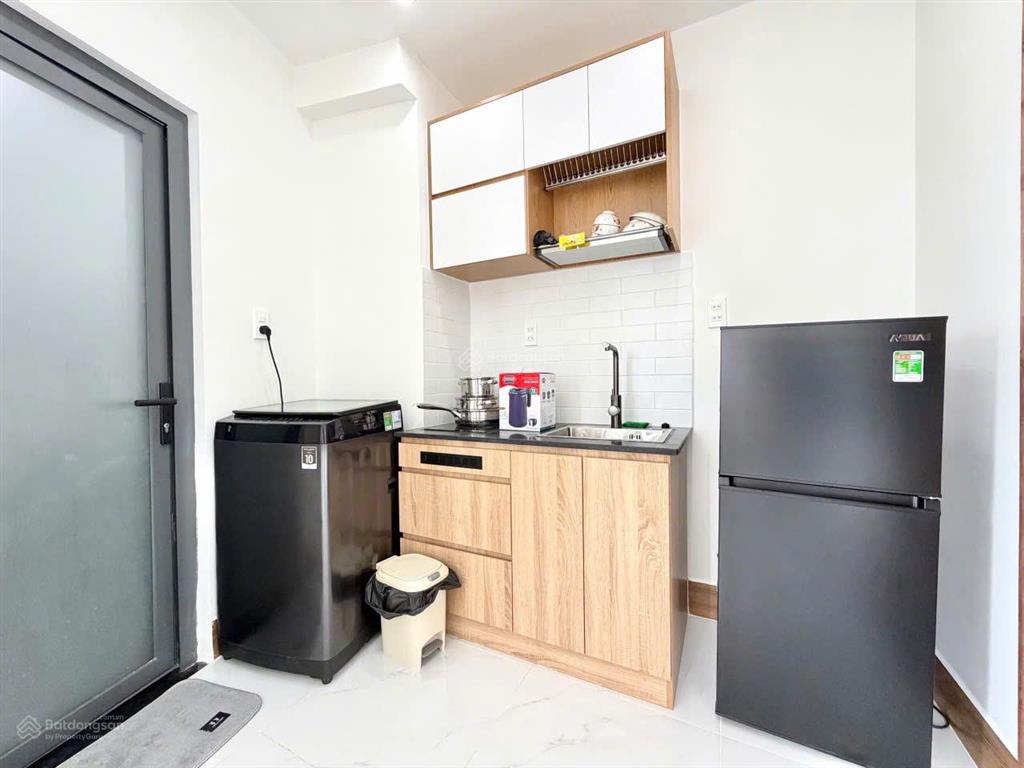 Studio thang máy giặt riêng có nhận ngắn hạn gần sân bay
