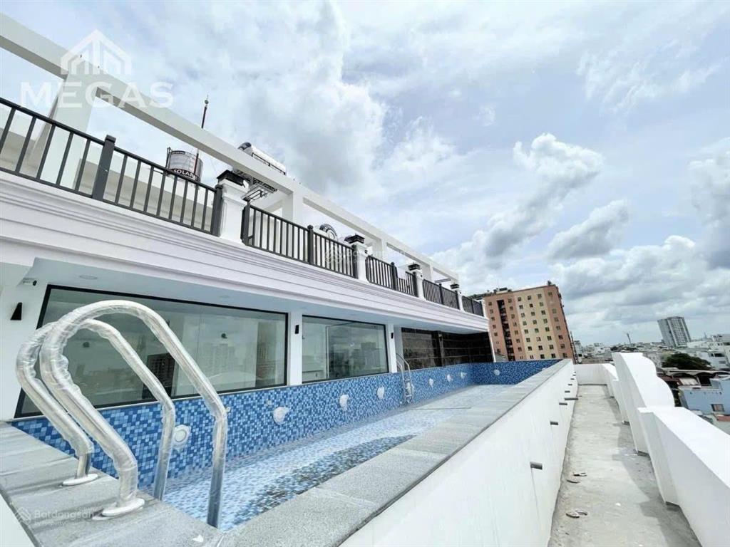 Building ch cao cấp mt đinh bộ lĩnh dt 22x22m cn 475m²  h8t  125 phòng  hđt 500tr/th giá 95tỷ