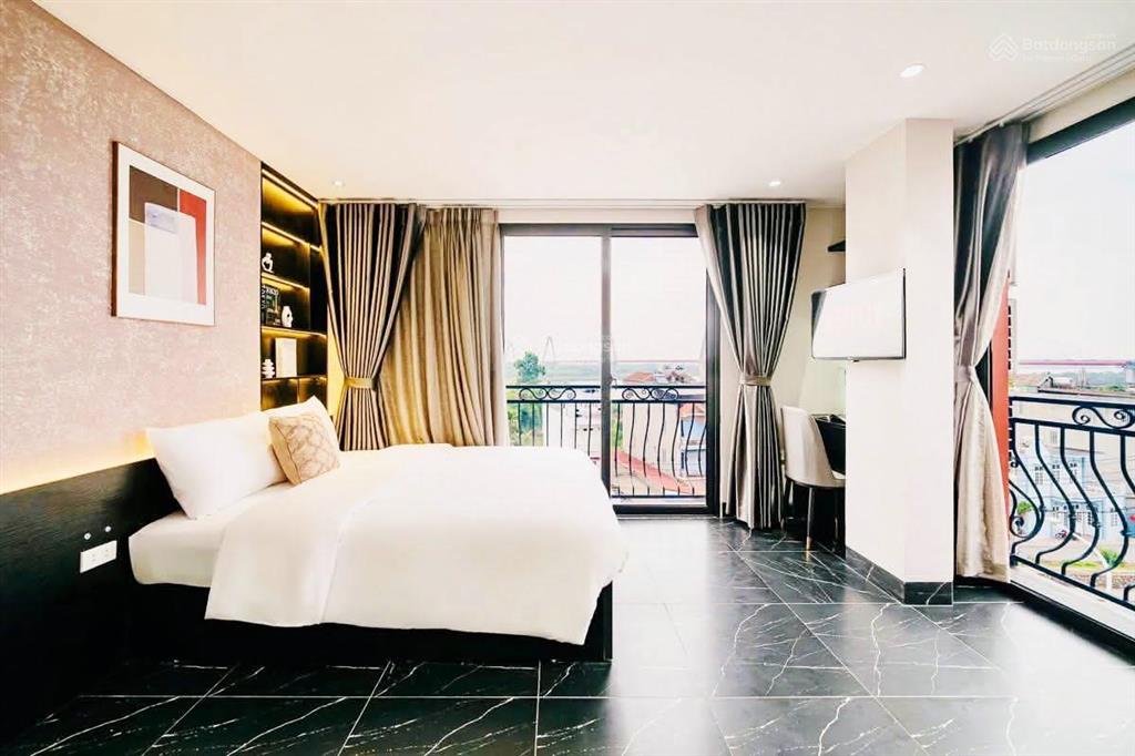 30 tỷ apartment mặt phố an dương vương 99m2*9t mt 10m, 28 phòng studio, dòng tiền 150tr/th